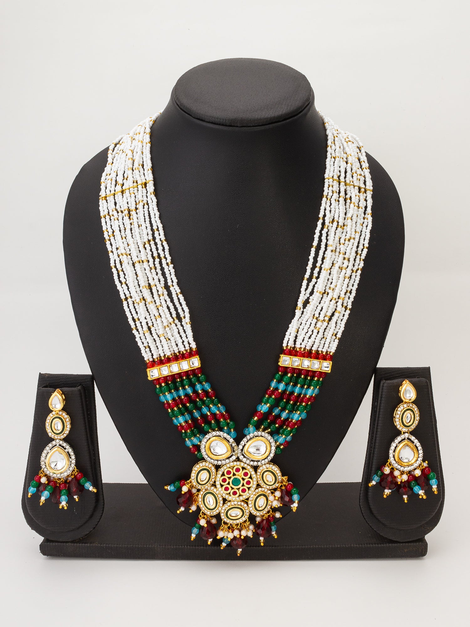 Aadita White Multi-Strand Necklace Set with Floral Pendant and Polki Earrings