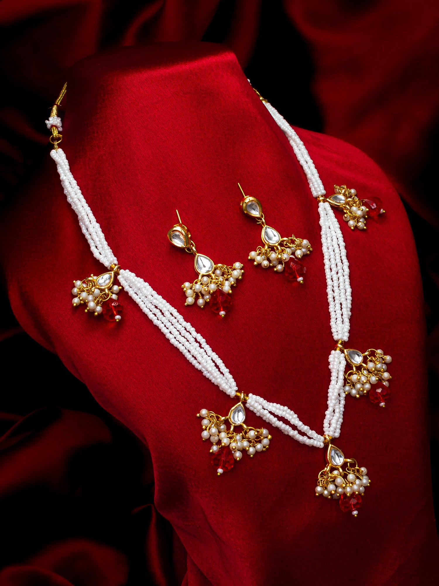 Aadita Gold Plated Multistrand Beaded Necklace Set with Kundan and Red Drop Stones
