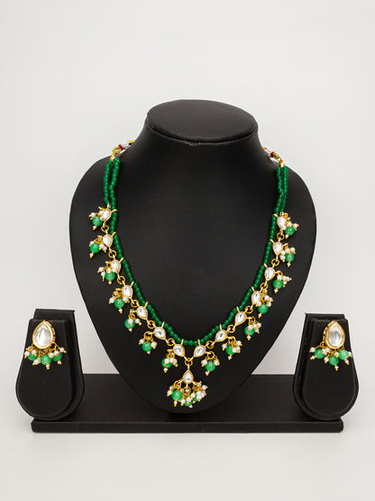 Aadita Gold-Plated Kundan Necklace Set with Green Beads and Stud Earrings