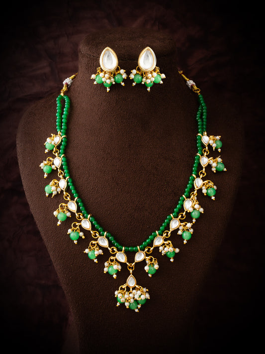 Aadita Gold-Plated Kundan Necklace Set with Green Beads and Stud Earrings