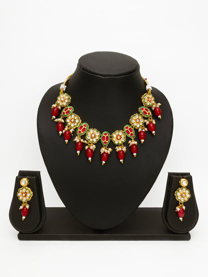 Aadita Gold Plated Kundan Floral Necklace Set with Red Beads