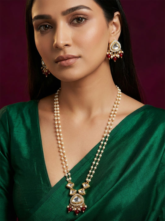 Aadita Gold Plated Kundan and Pearl Long Necklace Set with Red Accents