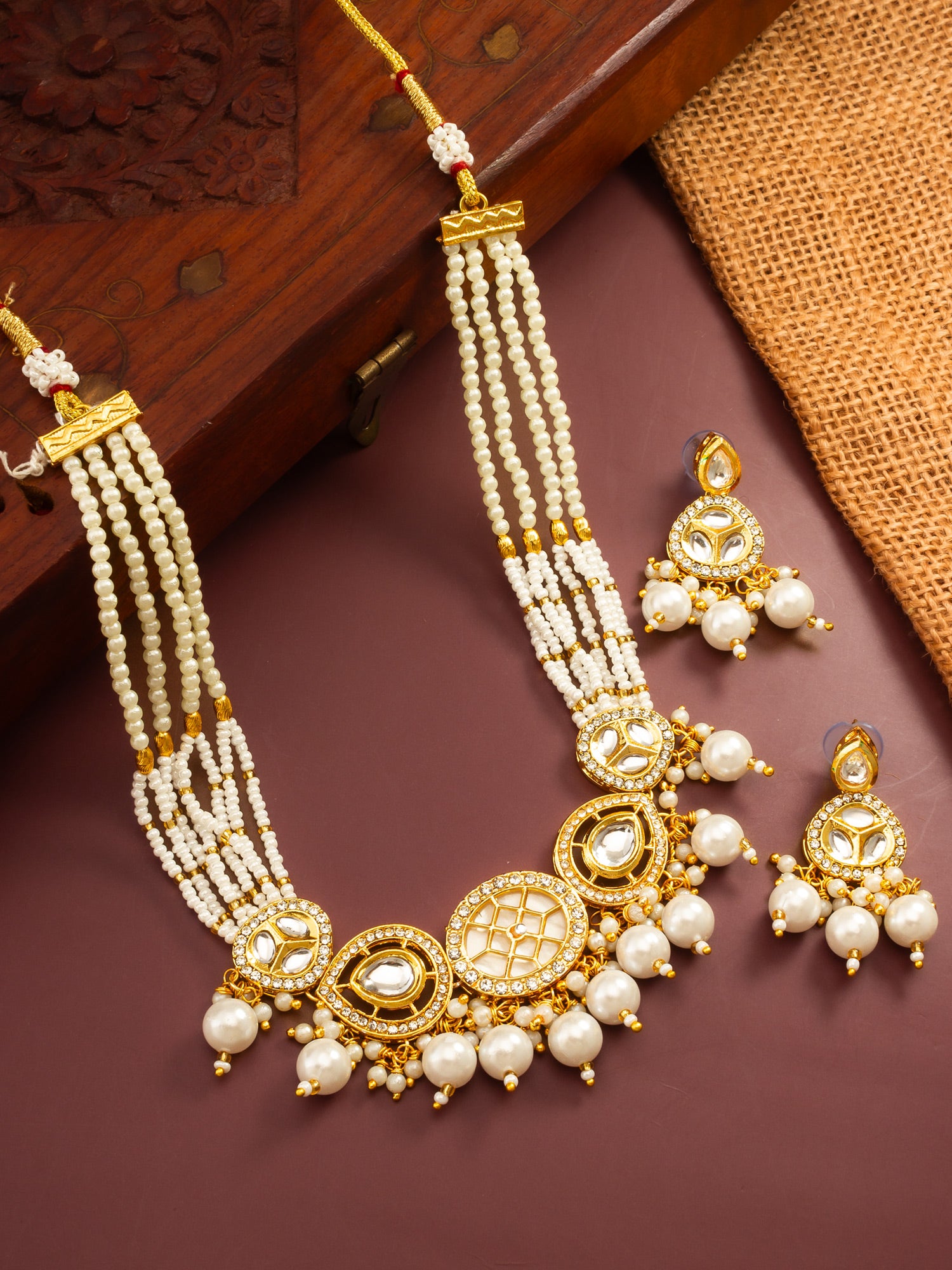 Aadita Gold Plated Kundan and Multi-Strand Pearl Choker Set