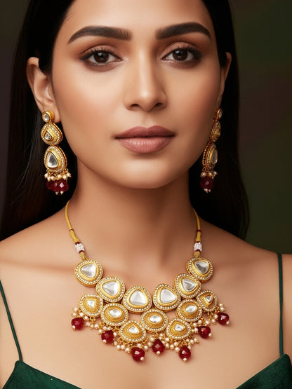 Aadita Gold Plated Kundan Studded Choker Necklace Set with Red Bead Drops
