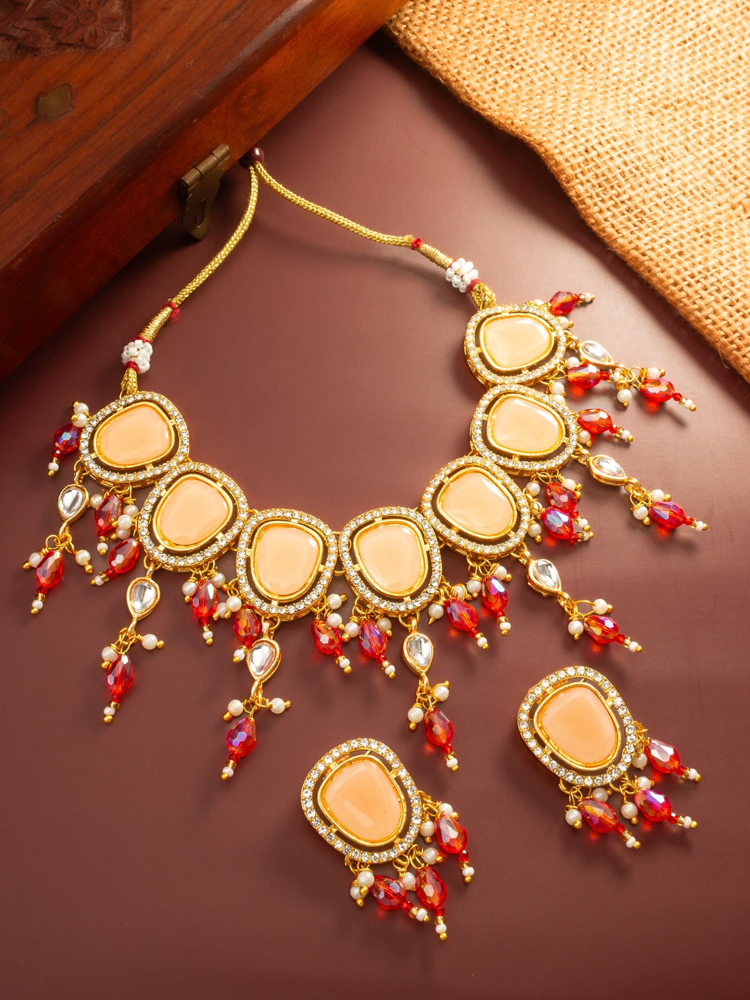 Aadita Gold Plated Peach Stone Choker Necklace with Dangles