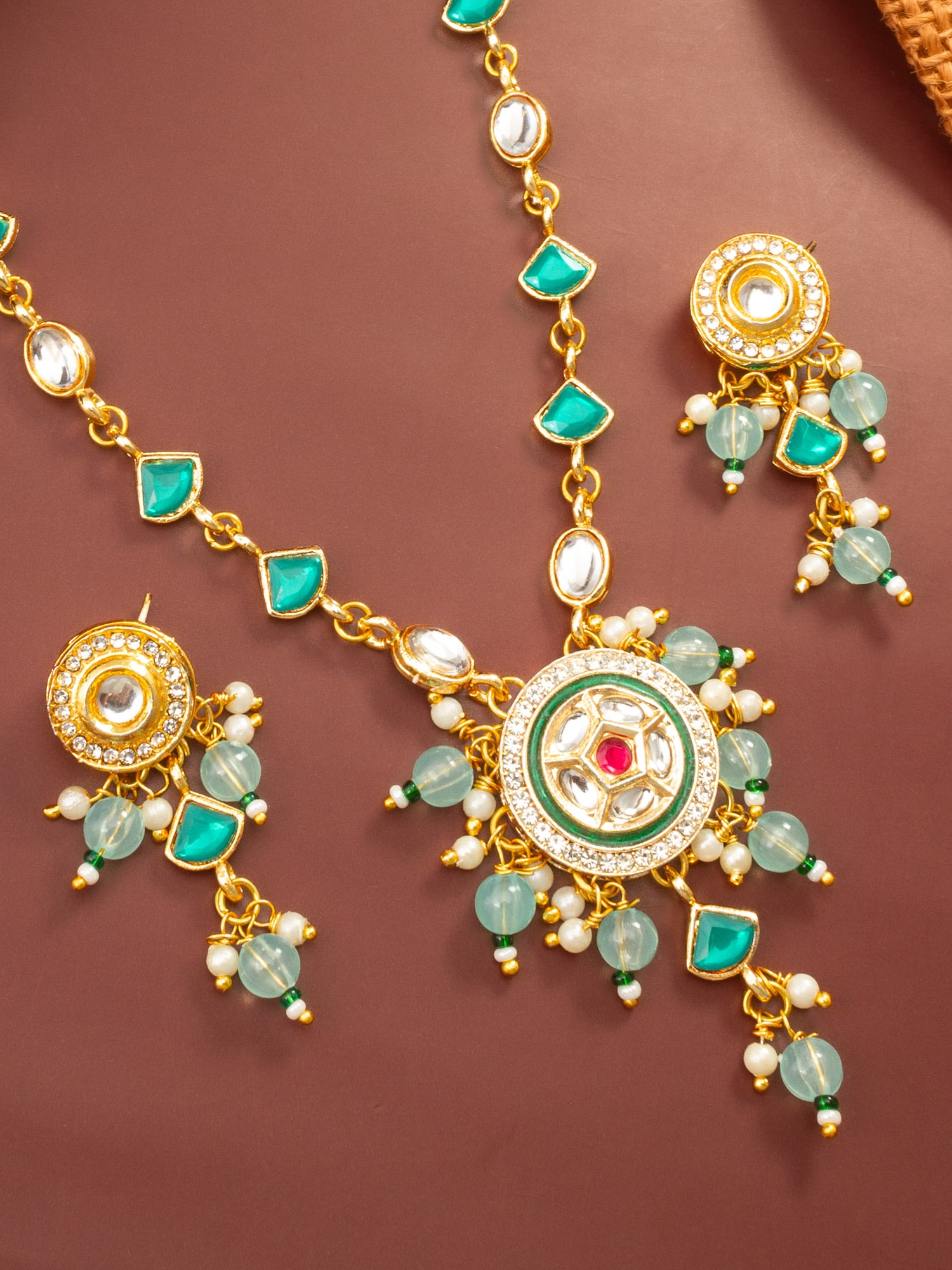 Aadita Gold Plated Green Stone Kundan Necklace with Circular Pendant