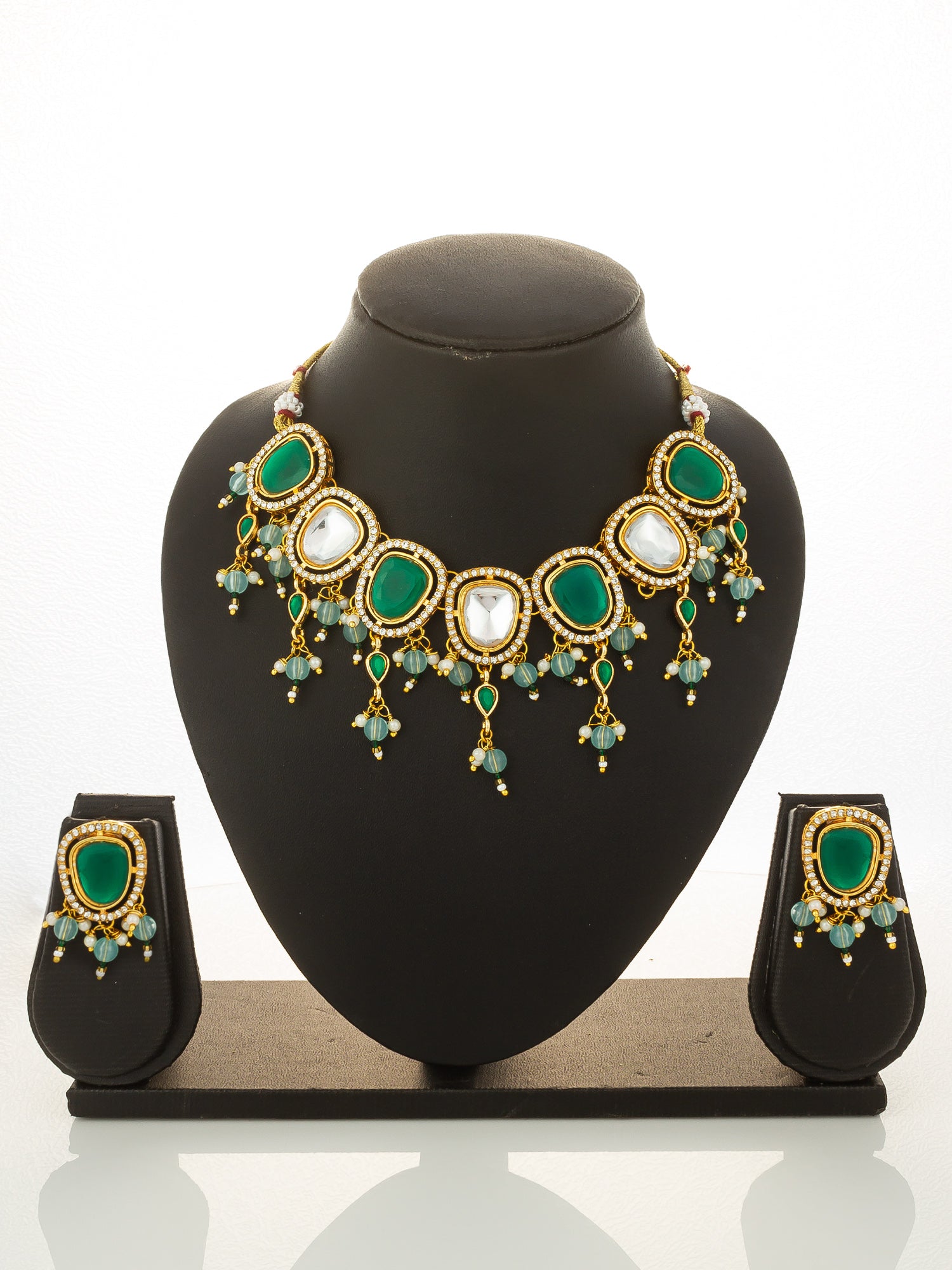 Aadita Gold Plated Green and White Kundan Statement Necklace Set