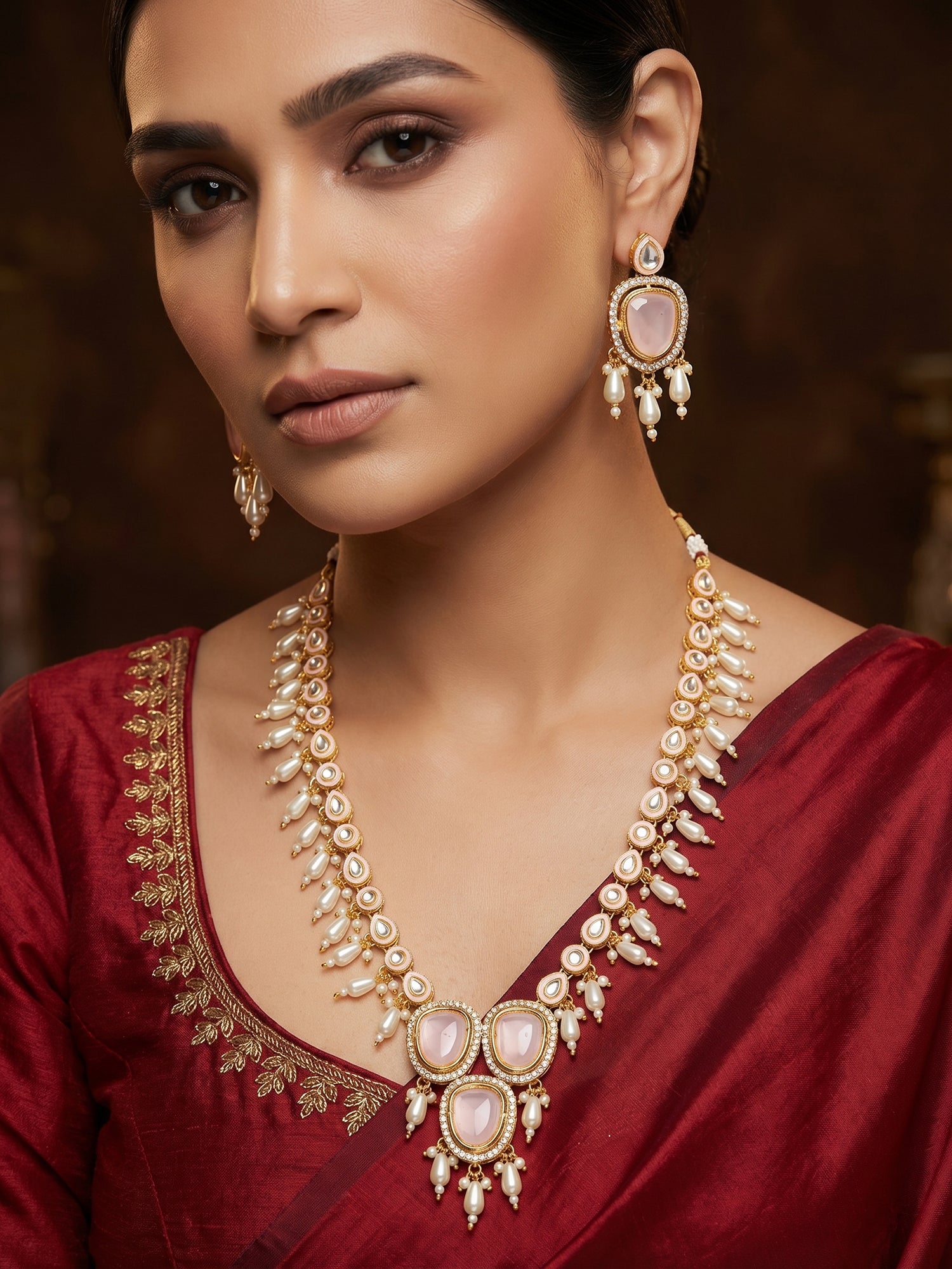 Aadita Gold-Plated Kundan Necklace Set with Stones and Pearl Drops