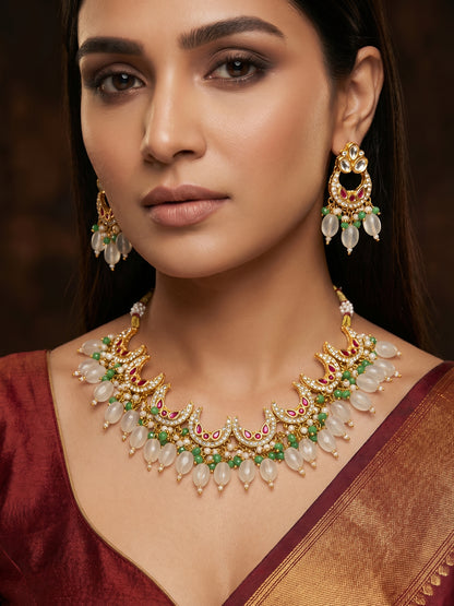 Aadita Gold Plated Kundan Necklace Set with Green Beads and White Drop with Chandbali Earrings