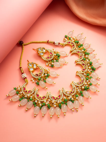Aadita Gold Plated Kundan Necklace Set with Green Beads and White Drop with Chandbali Earrings
