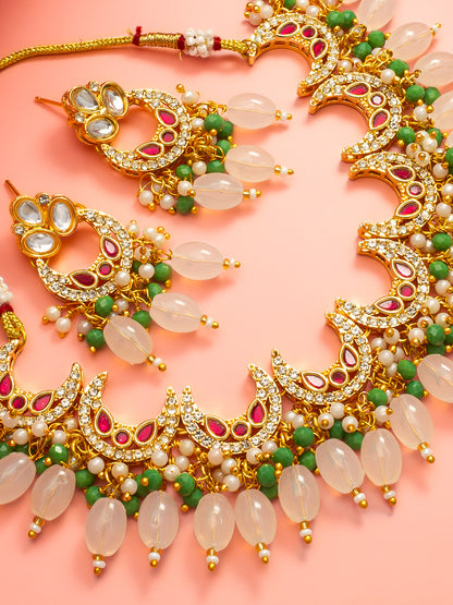 Aadita Gold Plated Kundan Necklace Set with Green Beads and White Drop with Chandbali Earrings