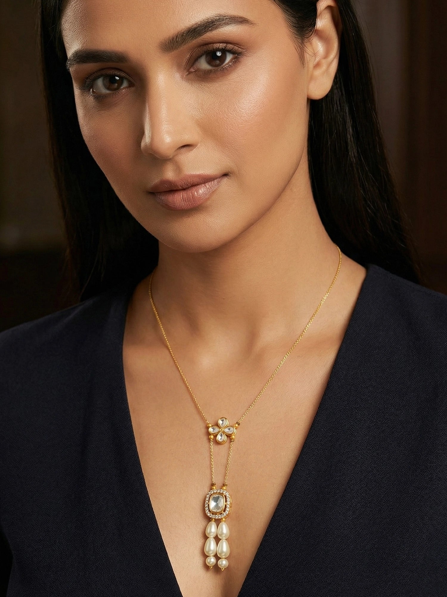 Aadita Gold Plated Kundan Pendant Necklace with Pearl Drops and Floral Motif