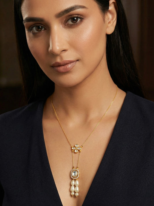 Aadita Gold Plated Kundan Pendant Necklace with Pearl Drops and Floral Motif
