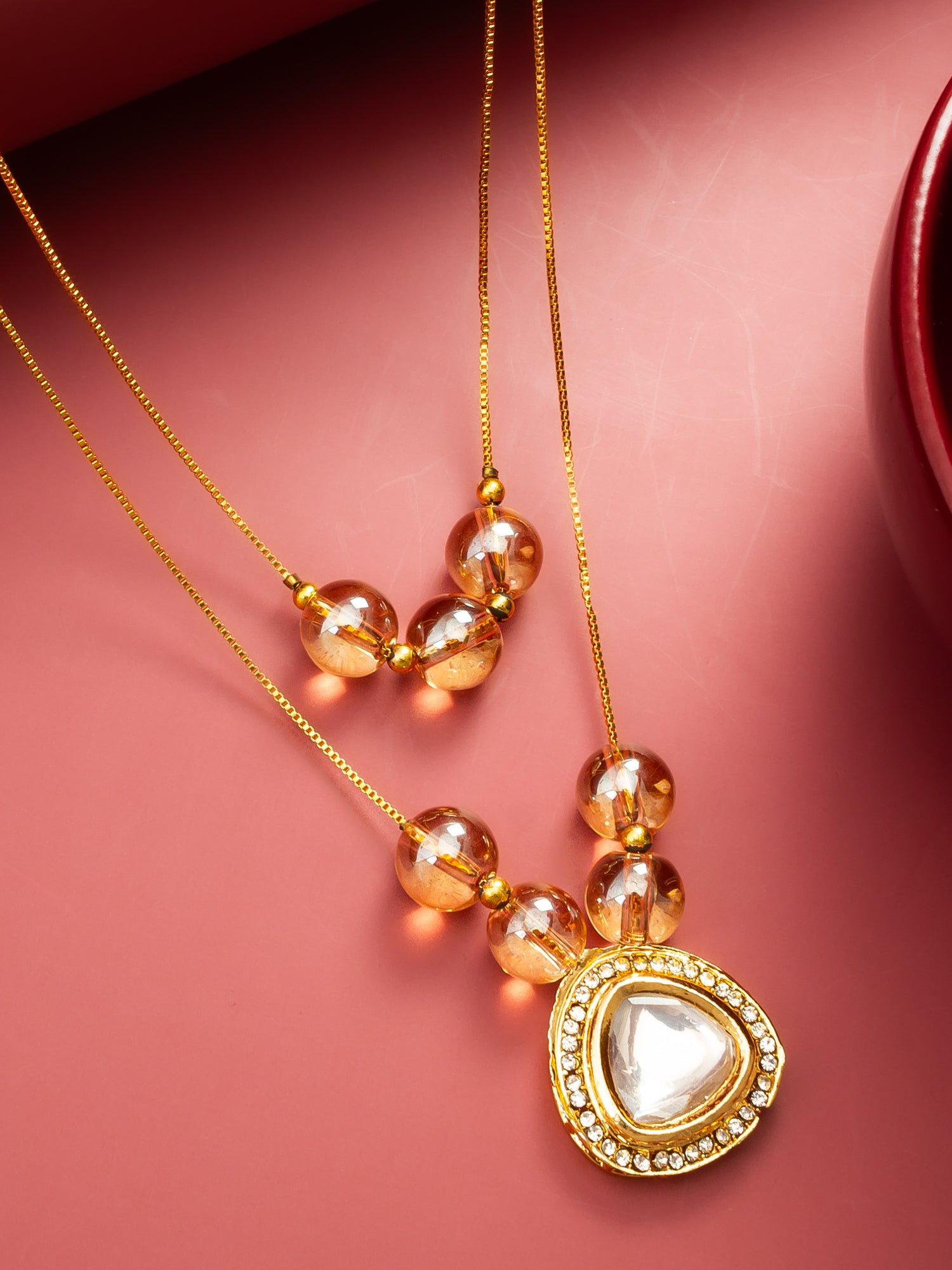 Aadita Gold Plated Double Layer Kundan Necklace with Crystal Beads and Triangular Pendant