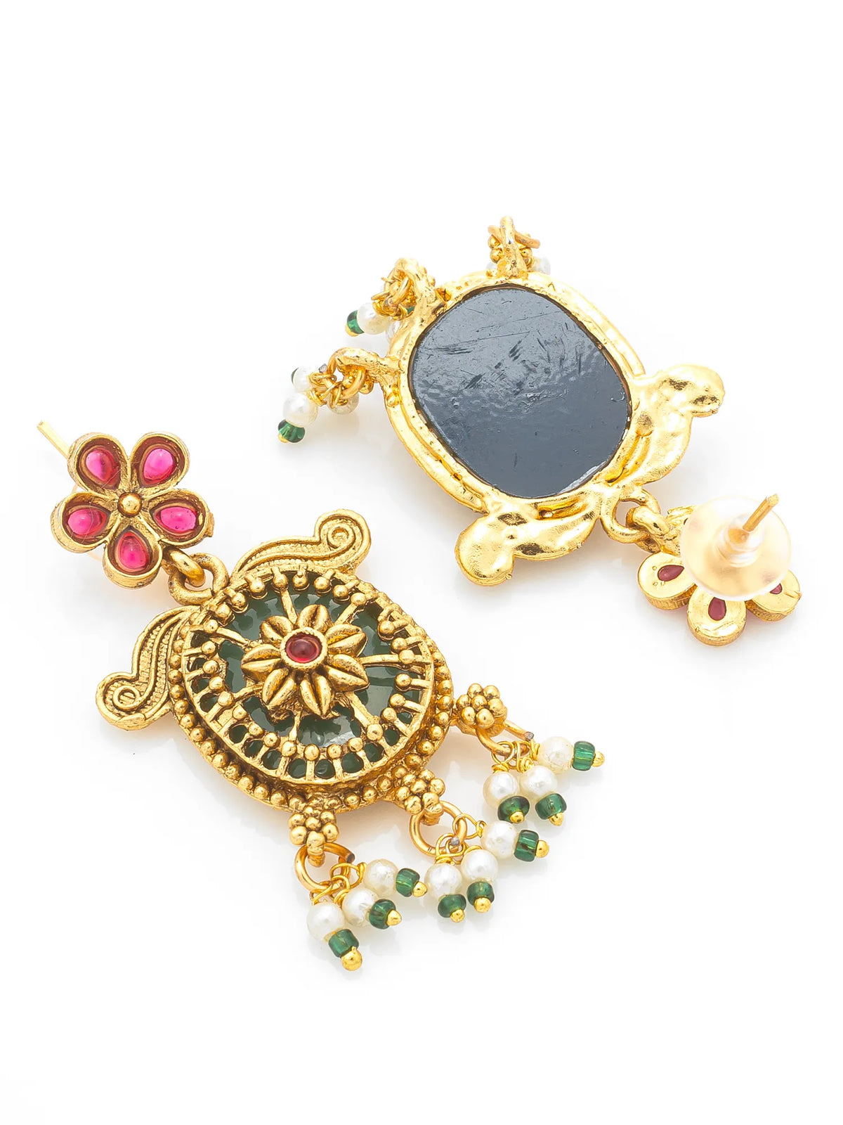 A pair of traditional Indian gold-plated earrings with green enamel, pink stone accents, and white pearl bead drops, displayed on a clean white background.