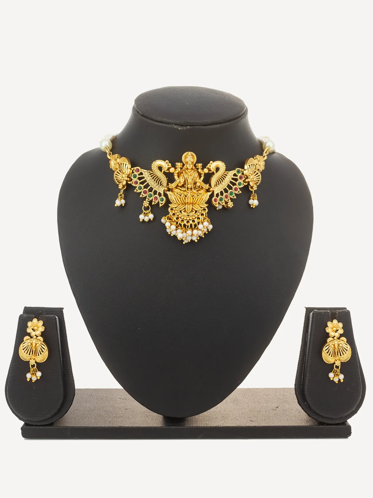 Gold-plated traditional Indian jewelry set featuring a choker necklace, matching drop earrings, and a ring, all displayed on a black jewelry bust stand against a white background.