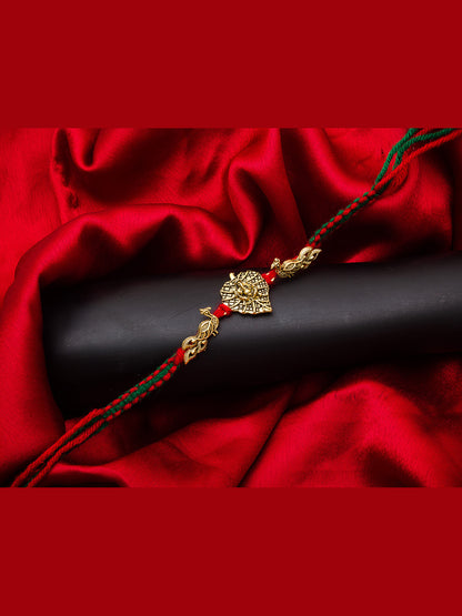 Aadita Ganesh Leaf Rakhi with Twin Peacock Design on Red-Green Thread