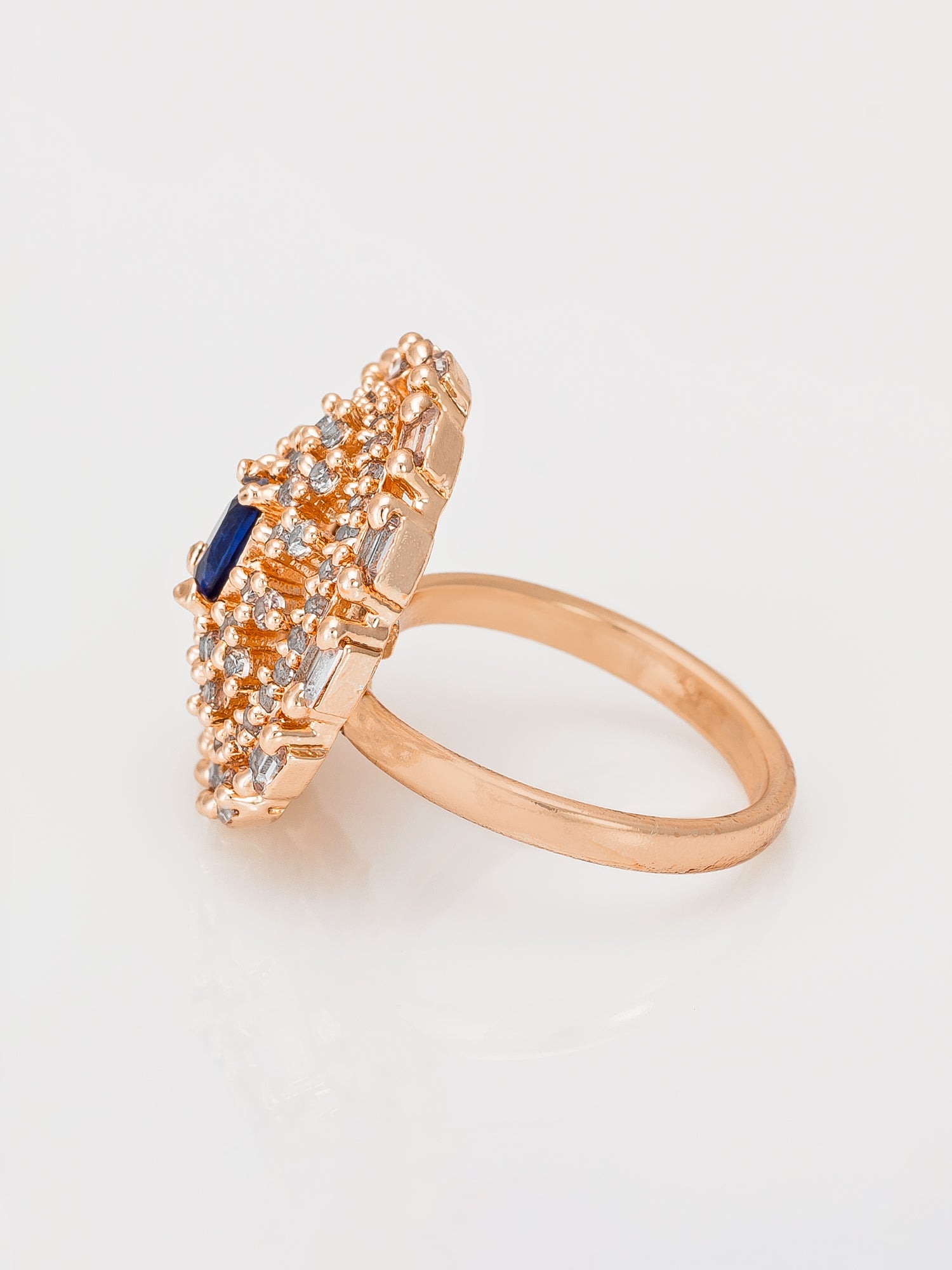 Aadita Rose Gold Tone Round Ring with Blue Oval Stone and Baguette Halo